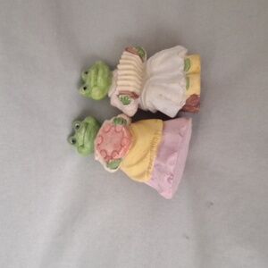 Two frog figurines